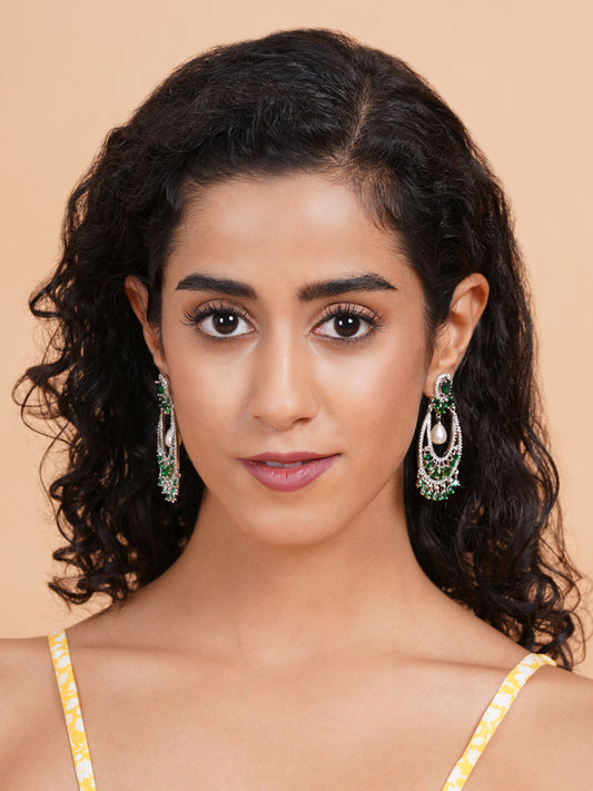 Green AD chandbali earrings with pearl drop, styled against green saree