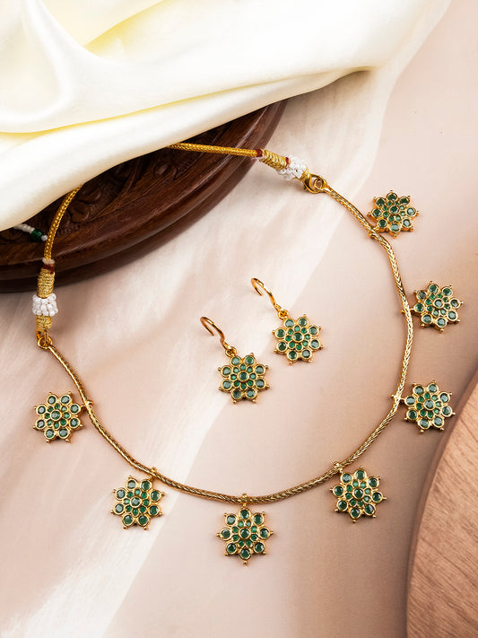 Sleek copper necklace with AD stone floral design, front view